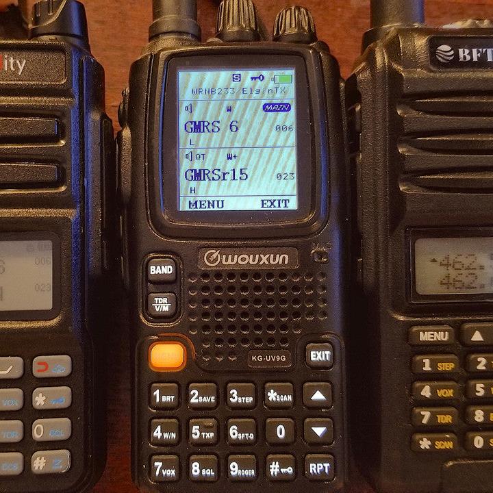 Three handheld two-way radios, side-by-side, showing customizations on their screens.