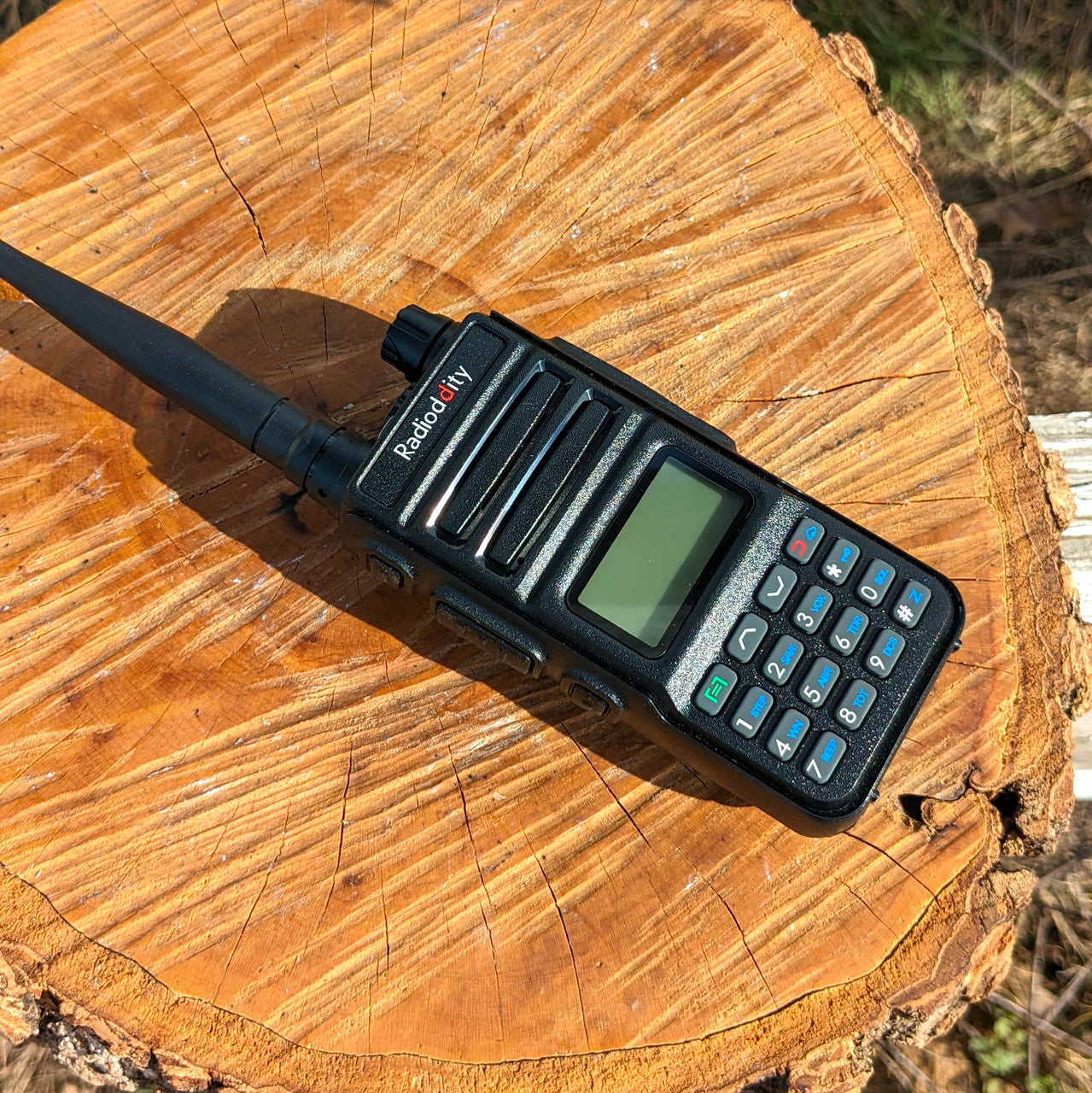 Radioddity GM-30 radio on a piece of wood.